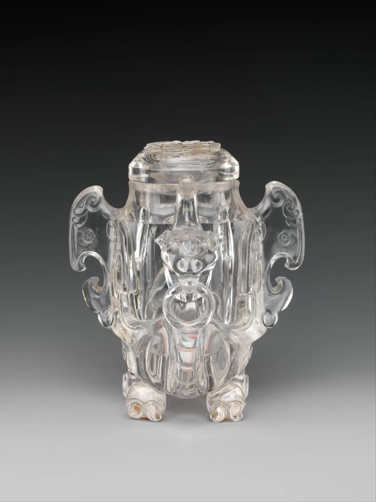 Vessel in the shape of a bird with archaic designs