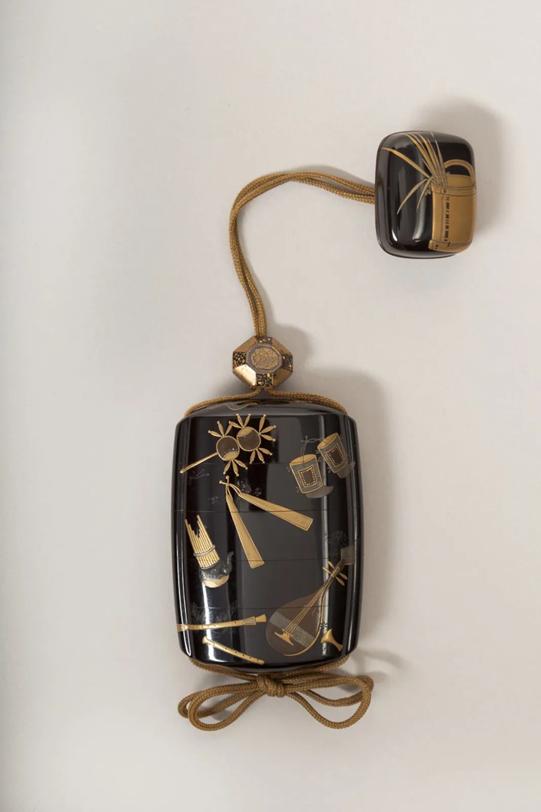 Inrō with Scattered Musical Instruments, Theatrical Implements, and Flowers