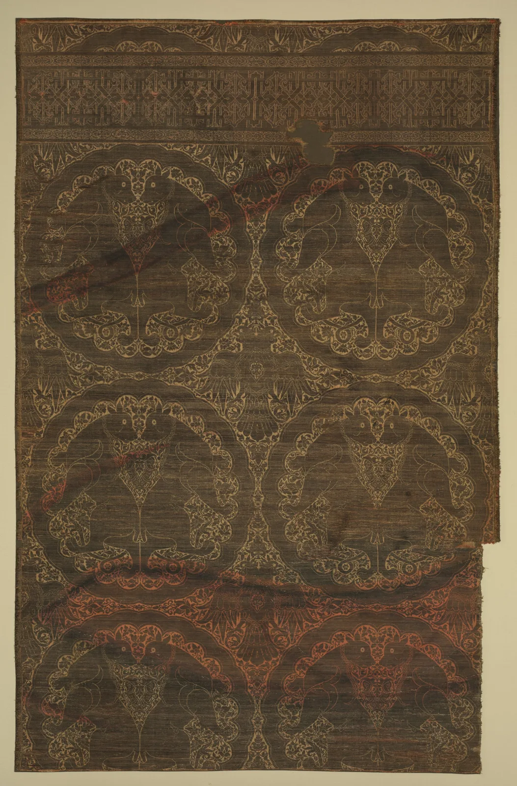 Cloth of gold with felines and eagles